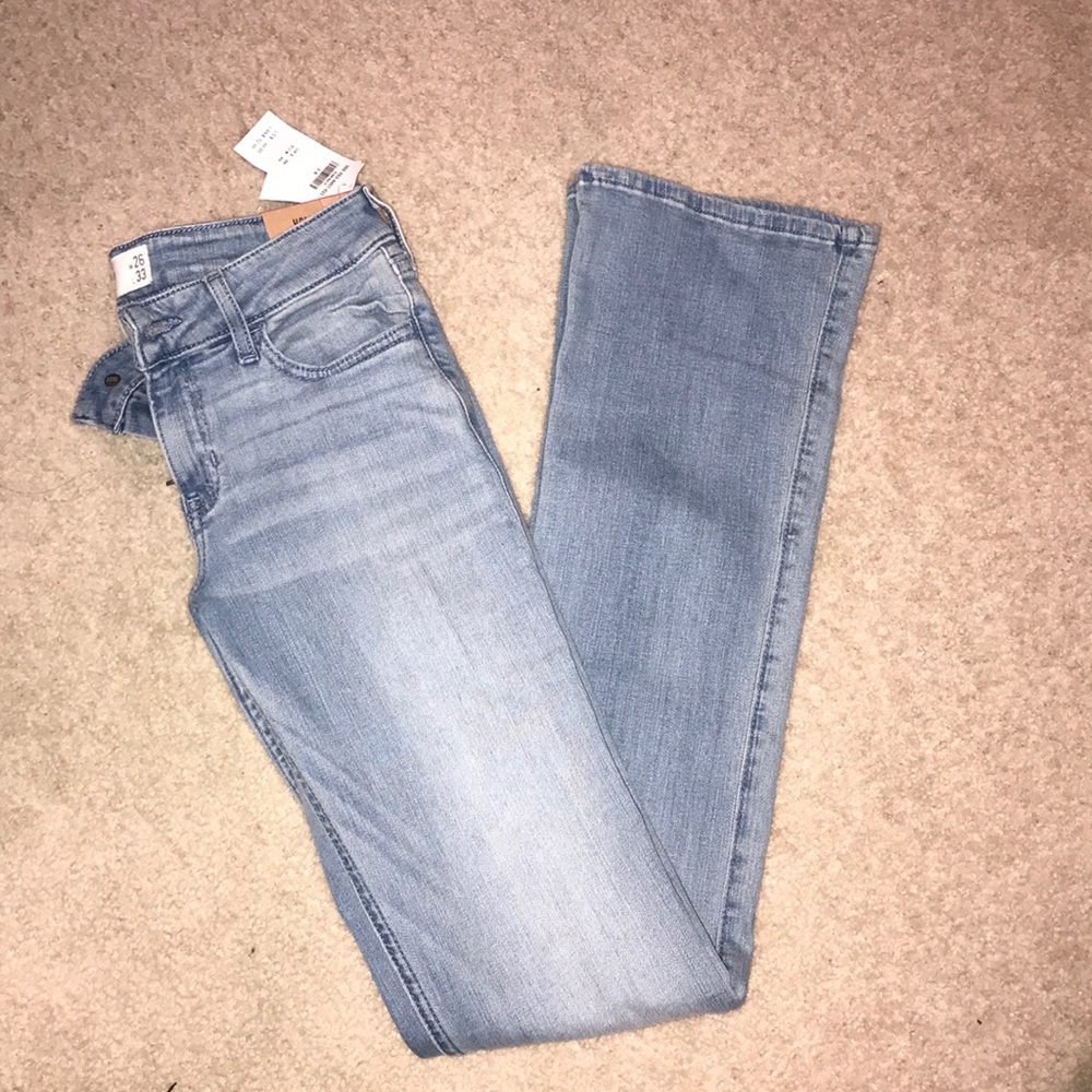 Hollister light washed blue jeans.